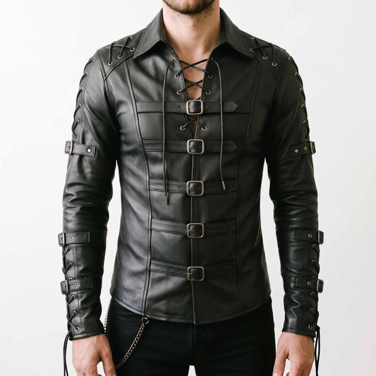 Front view of male model wearing handmade gothic black cowhide leather shirt with chest cord lacing, fold down collar, and five horizontal roller buckles