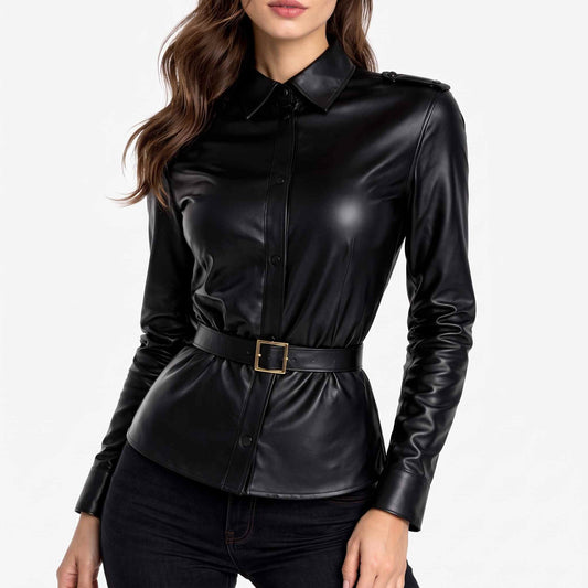 Front view of a woman wearing a black real leather belted shirt with shoulder epaulets and a cinched waist belt.