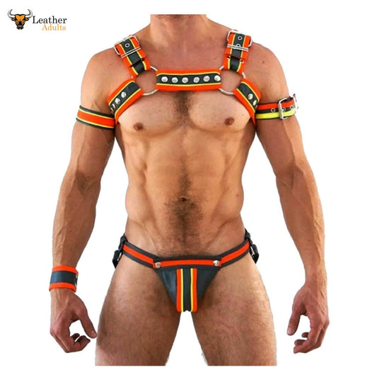 This image features a men's multi-color real leather chest harness designed with an eye-catching, vibrant striped pattern. The harness includes adjustable straps and is accompanied by a matching jockstrap, two arm bands, and one wrist band.