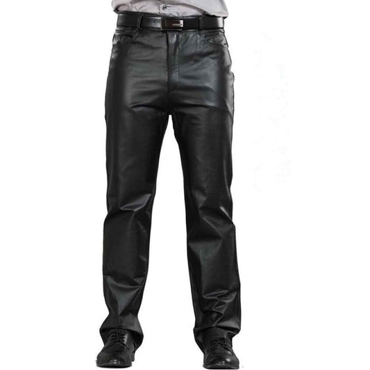 A man wearing black genuine cowhide leather pants with a back zipper and pockets, paired with a grey shirt and black dress shoes.