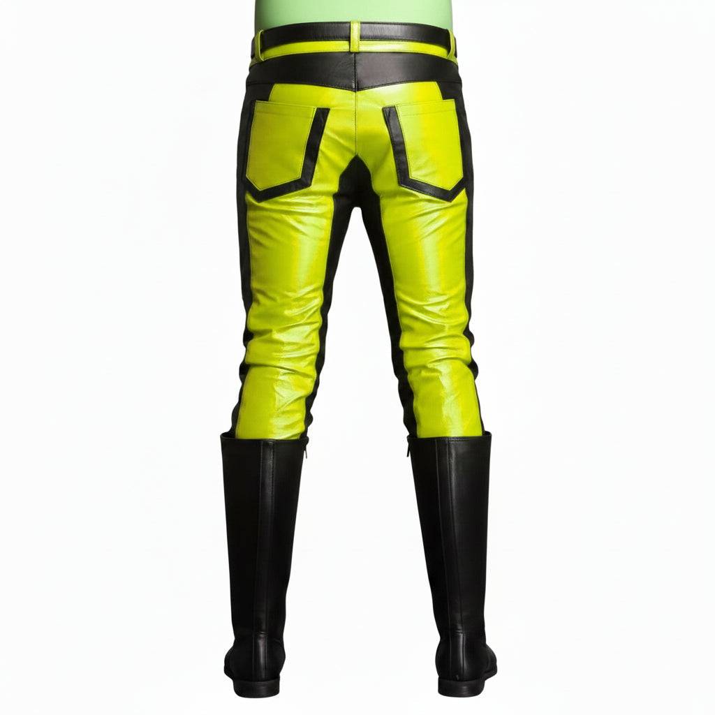 High-visibility neon yellow pants with black trim and pocket details, shown from the back on a model wearing black knee-high boots against a white background.