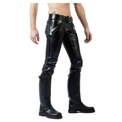 Black leather chaps pants with a matching belt, worn by a model with black leather chaps boots, shown against a plain white background.