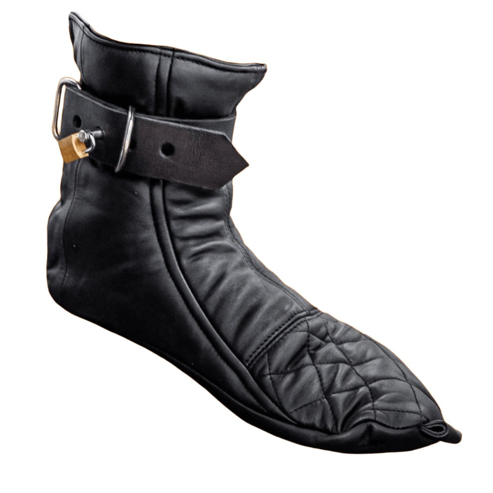 Black leather boot with a gold buckle on a white background