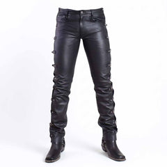 Full length front studio shot of handmade black leather gothic punk pants displaying side roller buckles and boot tuck