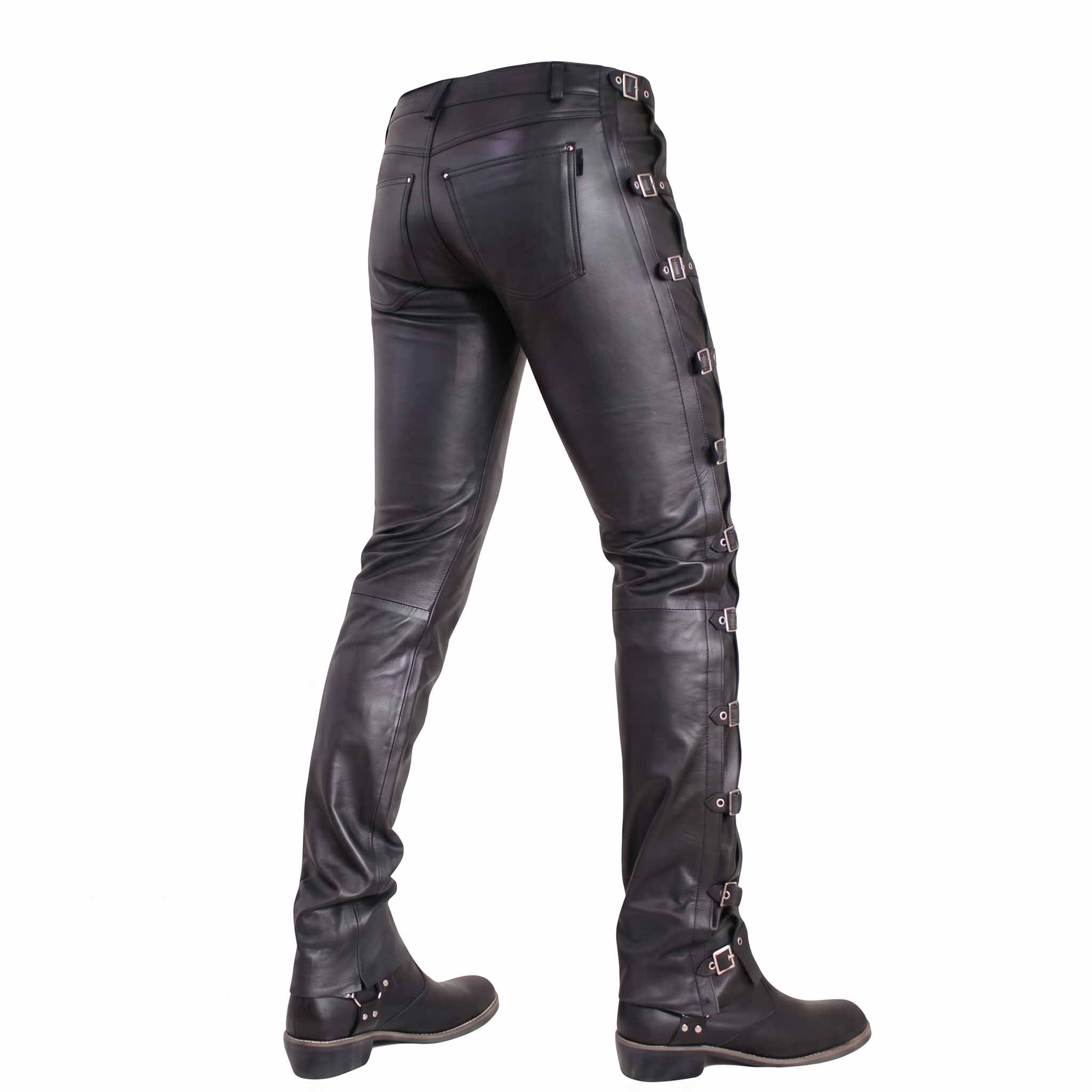 Rear three quarter view of black cowhide leather buckle pants showing full leg length and stacked side buckles down to ankles
