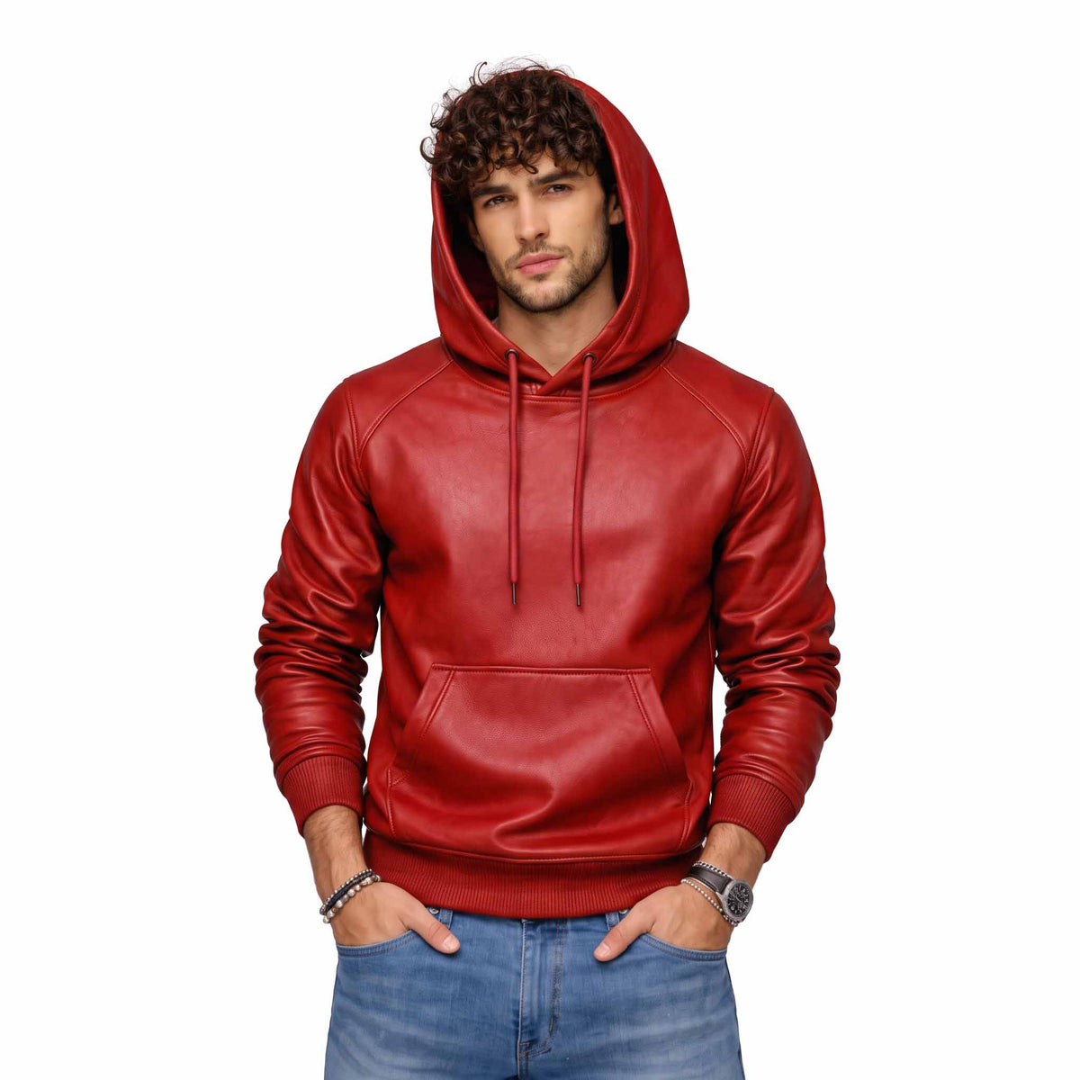 Full front shot of handsome curly haired man wearing handmade red sheepskin leather hoodie with hood up and hands in pockets
