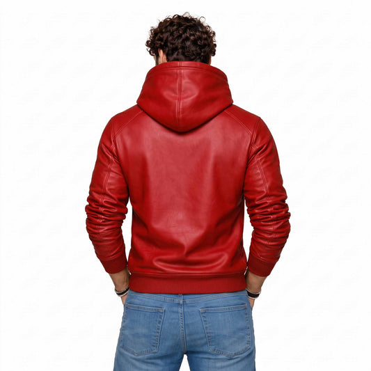 Back view of man wearing tailored red leather hoodie showing clean back yoke, hood drape, and ribbed waistband over blue jeans