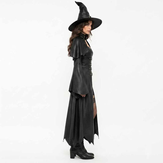 Side profile of the long black leather gothic witch coat showing the layered shoulder capelet, wide sleeve silhouette, and high-pointed leather witch hat.