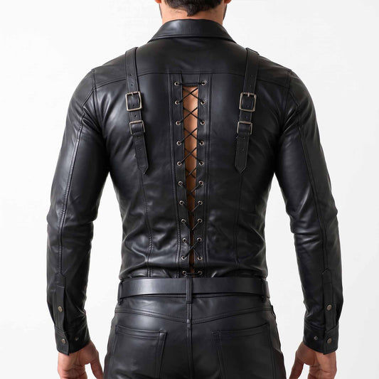 Direct back view of man modeling black cowhide leather shirt showing open spine panel with corset lacing and vertical buckle straps