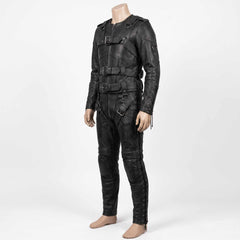 Three quarter profile of handmade black leather suit on mannequin showing sleeve cord lacing, accordion flex knees, and side leg eyelets