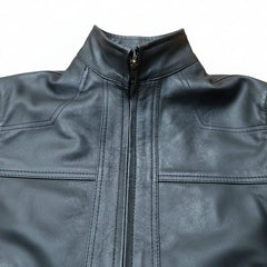 Black leather jacket with a stand-up collar and front zipper, shown against a plain white background.