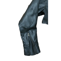 A close-up of a black leather jacket sleeve, showing the elbow panel, a zippered cuff detail, and the smooth leather texture against a plain white background.
