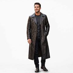 Full length front studio view of handsome smiling man wearing handmade black real leather double breasted trench coat on white background