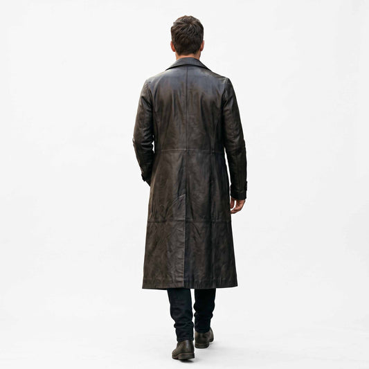 Back full length studio view of mens black genuine leather duster coat showing tailored vertical back seams and center split walking vent