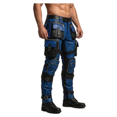 A model wearing blue and black tactical leather pants with multiple utility pockets, buckles, and straps, paired with black boots against a neutral beige background.