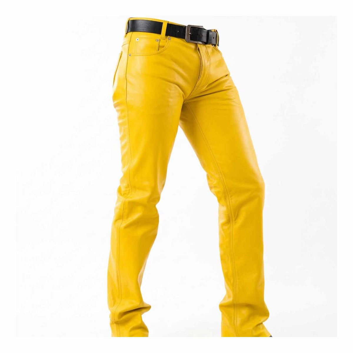 hree-quarter front view showing the fit, leg drape, and side seam detailing of men's yellow leather biker trousers.