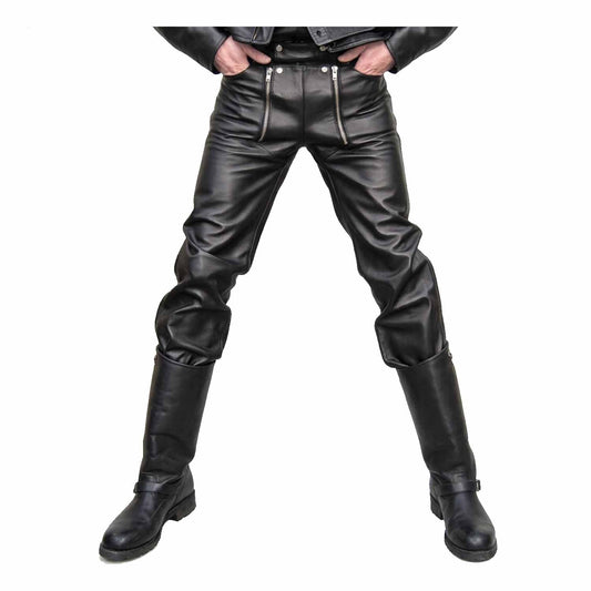 Front view of a man wearing black cowhide leather carpenter pants tucked into tall leather biker boots.