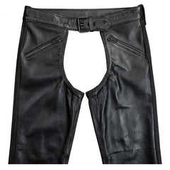 Close-up shot of men's black leather pants converted into open-crotch chaps with the front quilted codpiece panel detached.