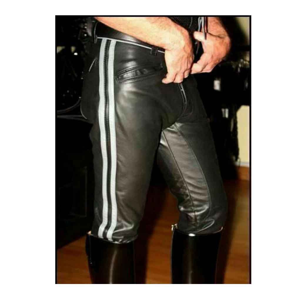 Side profile view of a man wearing black cowhide leather breeches featuring silver dual vertical side stripes tucked into tall riding boots.