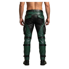 Rear view of a man wearing dark green and black leather cargo pants with utility pockets and straps, paired with black boots against a neutral studio background.