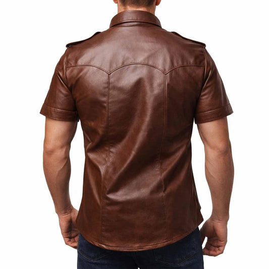 Rear view showing the tailored back yoke and vertical panel stitching on a men's brown short sleeve leather shirt.