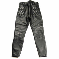 Flat lay back view of men's black cowhide leather breeches displaying diamond-quilted rear pockets and ankle cuff zippers.