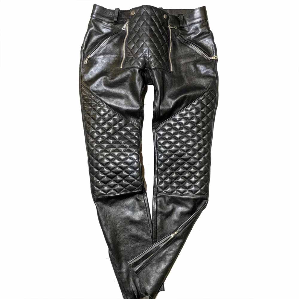 Front view of men's black real cowhide leather pants with quilted knee panels and zipper detailing.