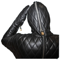 Black quilted jacket with a hood and gloves on a white background
