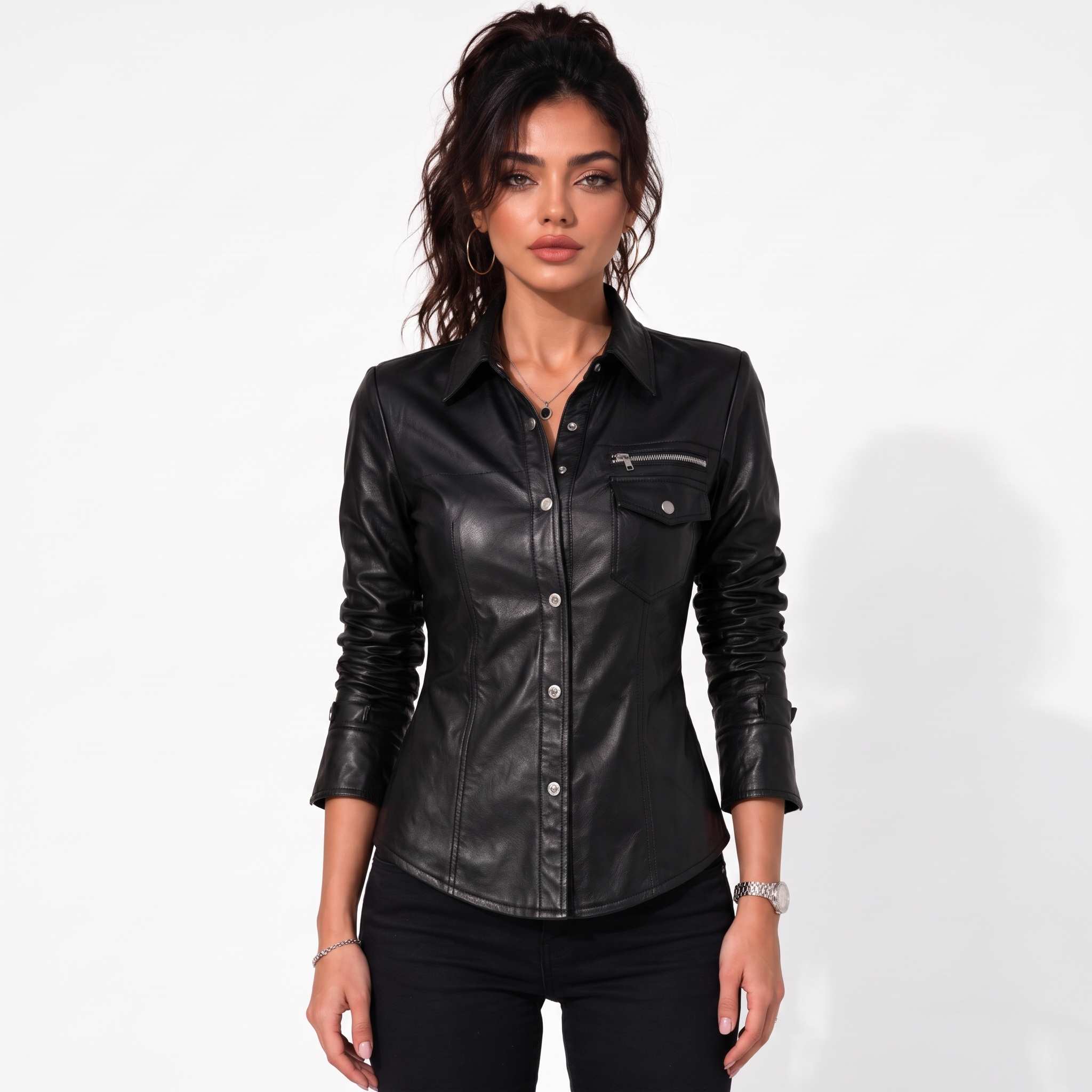 Full front portrait of a woman wearing a handcrafted black sheepskin leather button-down top paired with black jeans.