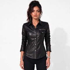 Full front portrait of a woman wearing a handcrafted black sheepskin leather button-down top paired with black jeans.