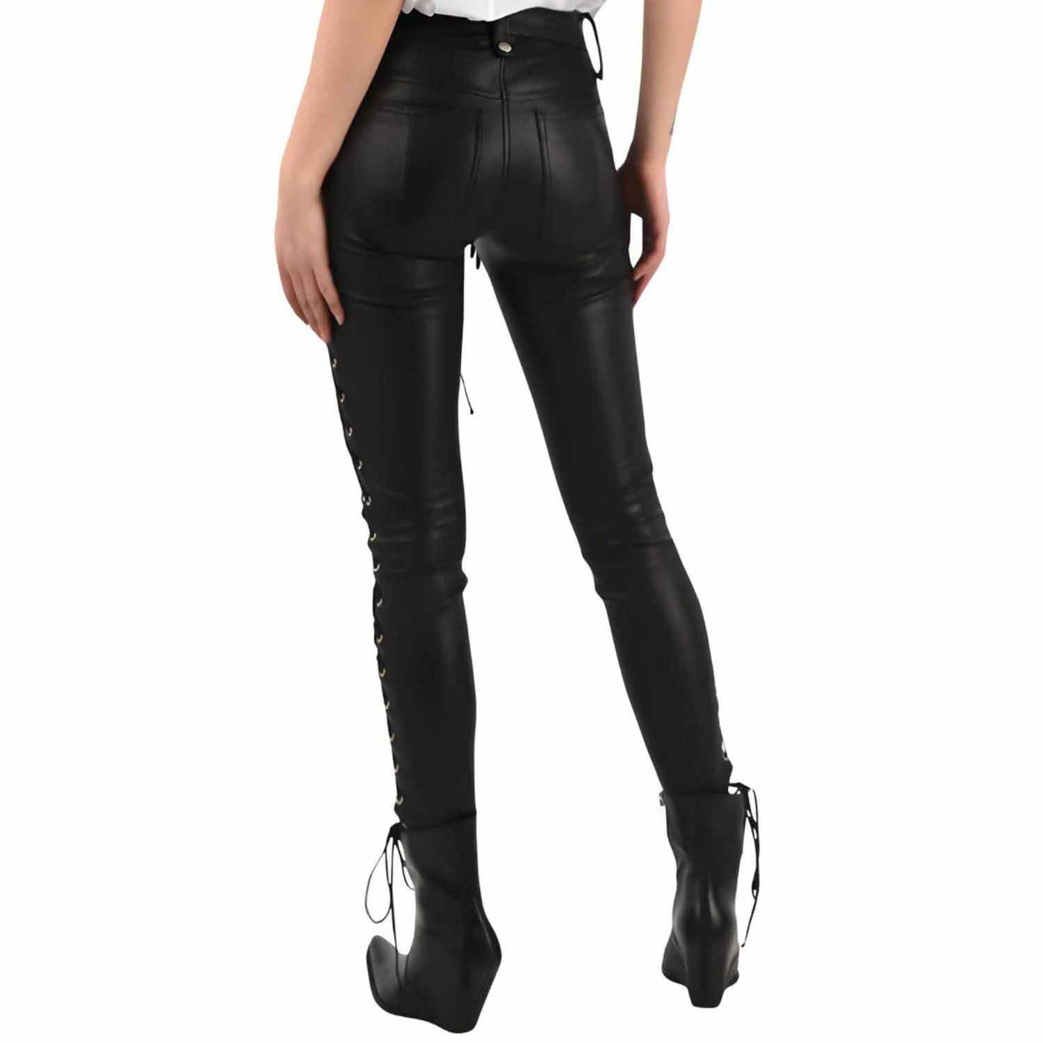 Back view of woman wearing skin tight black genuine leather trousers showing rear patch pockets, yoke seam, and side lace up cords