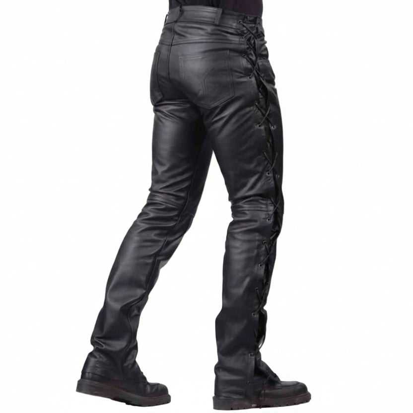 Black leather motorcycle pants with lace-up side detailing and a skull graphic on the lower leg, shown on a model from the back against a white background.