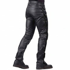 Black leather motorcycle pants with lace-up side detailing and a skull graphic on the lower leg, shown on a model from the back against a white background.