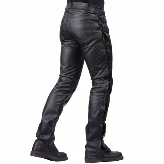 Black leather motorcycle pants with lace-up side detailing and a skull graphic on the lower leg, shown on a model from the back against a white background.