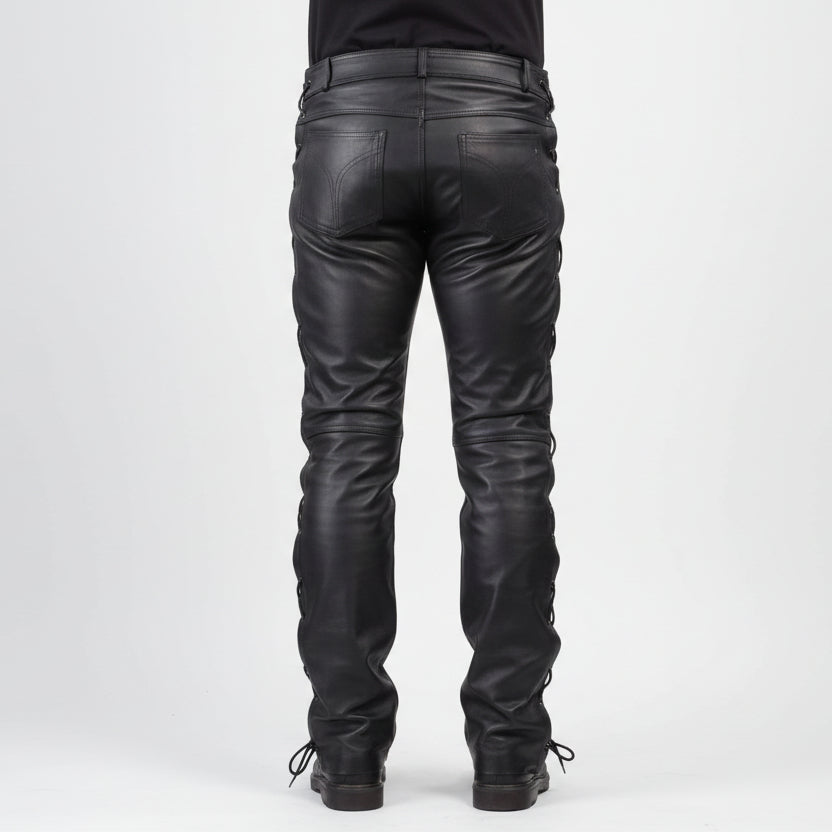 Rear view of black leather pants with side lacing and a bull graphic patch on the lower left leg, shown on a model against a white background.