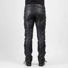 Rear view of black leather pants with side lacing and a bull graphic patch on the lower left leg, shown on a model against a white background.