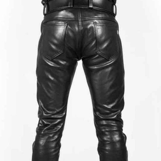 Rear view of black leather pants on a model, showing the back pockets and a black belt at the waist, set against a plain white background.