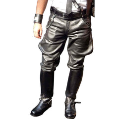 A person wearing shiny black leather pants with gathered cuffs, black knee-high boots, a black belt, and a black wrist cuff, shown against a plain white background.