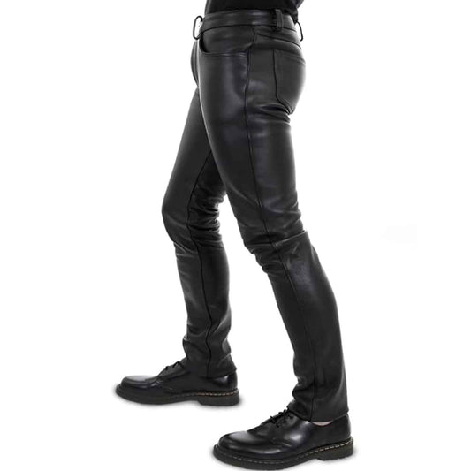 Black leather slim-fit pants shown on a model from the waist down, paired with black leather boots, against a plain white background.
